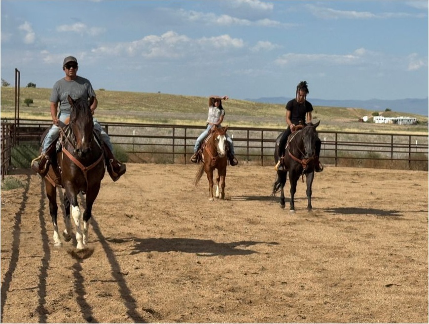 Riders enjoying the actual Wopican Ranch arena — photo from our stories